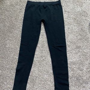 Thick black leggings <keep you warm>